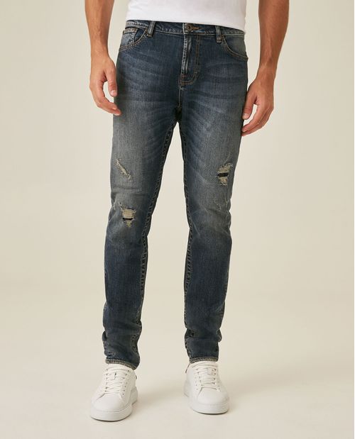 Jean de Hombre Skinny Fit Tiro Medio Lavado Oscuro con Rotos y Parches en Contraste en Mezcla de Algodón Famous