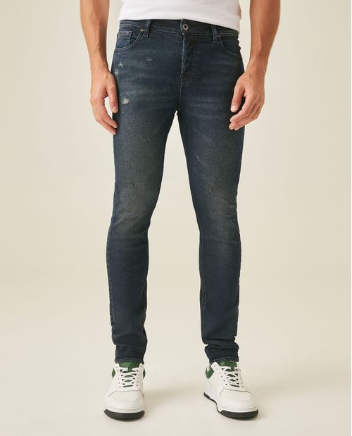 Jean de Hombre Rider Skinny Fit Tiro Bajo Lavado Ultra Oscuro Desgastes y Raspones en Mezcla de Algodón Reciclado